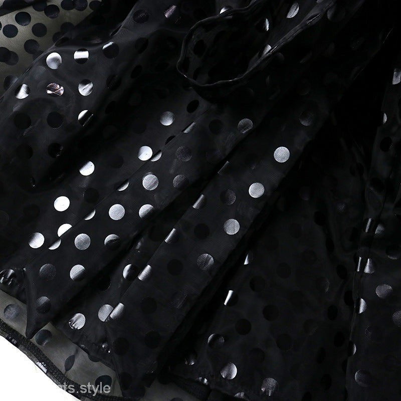 Black polka dot fabric showcased in SEE THROUGH ORGANZA DRESS, ideal for sexy organza blouses and sling dresses