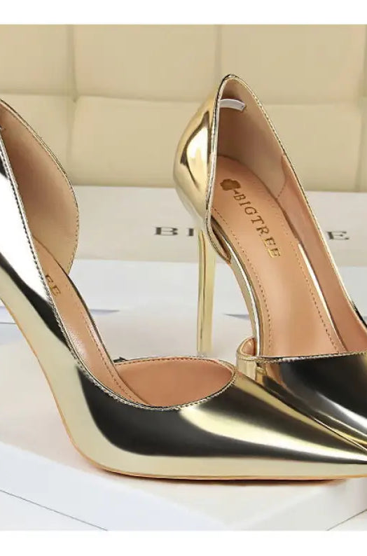 Gold metallic simple stiletto heel pumps with pointed toes and clear ankle strap