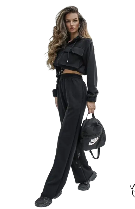 Woman in elegant Vetements suit with long sleeve cropped hoodie and wide-leg pants