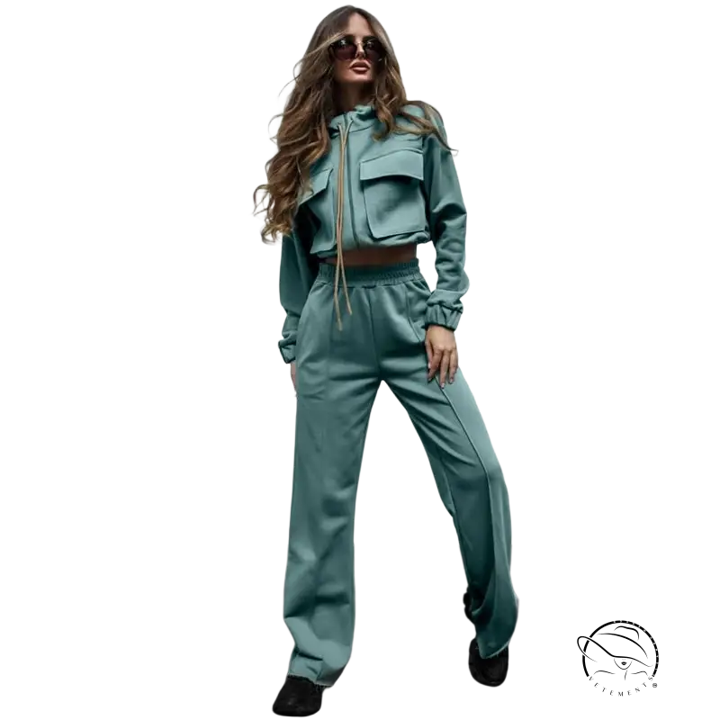 Woman in teal tracksuit elegant vetements suit with long sleeve