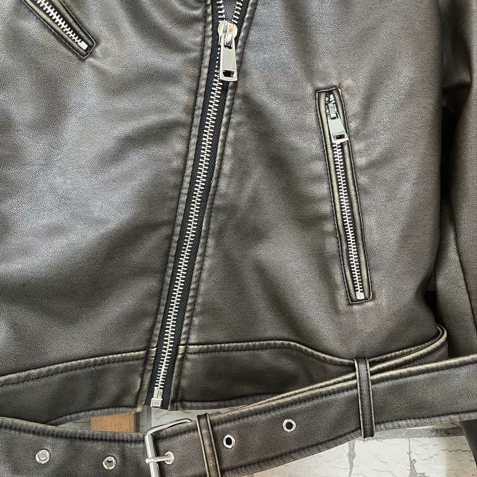 Beautiful warm Langry leather jacket with silver zippers and belt