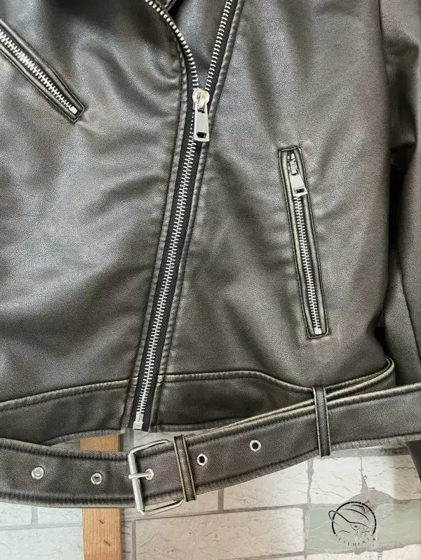 Beautiful warm langry leather jacket with silver zippers and belt
