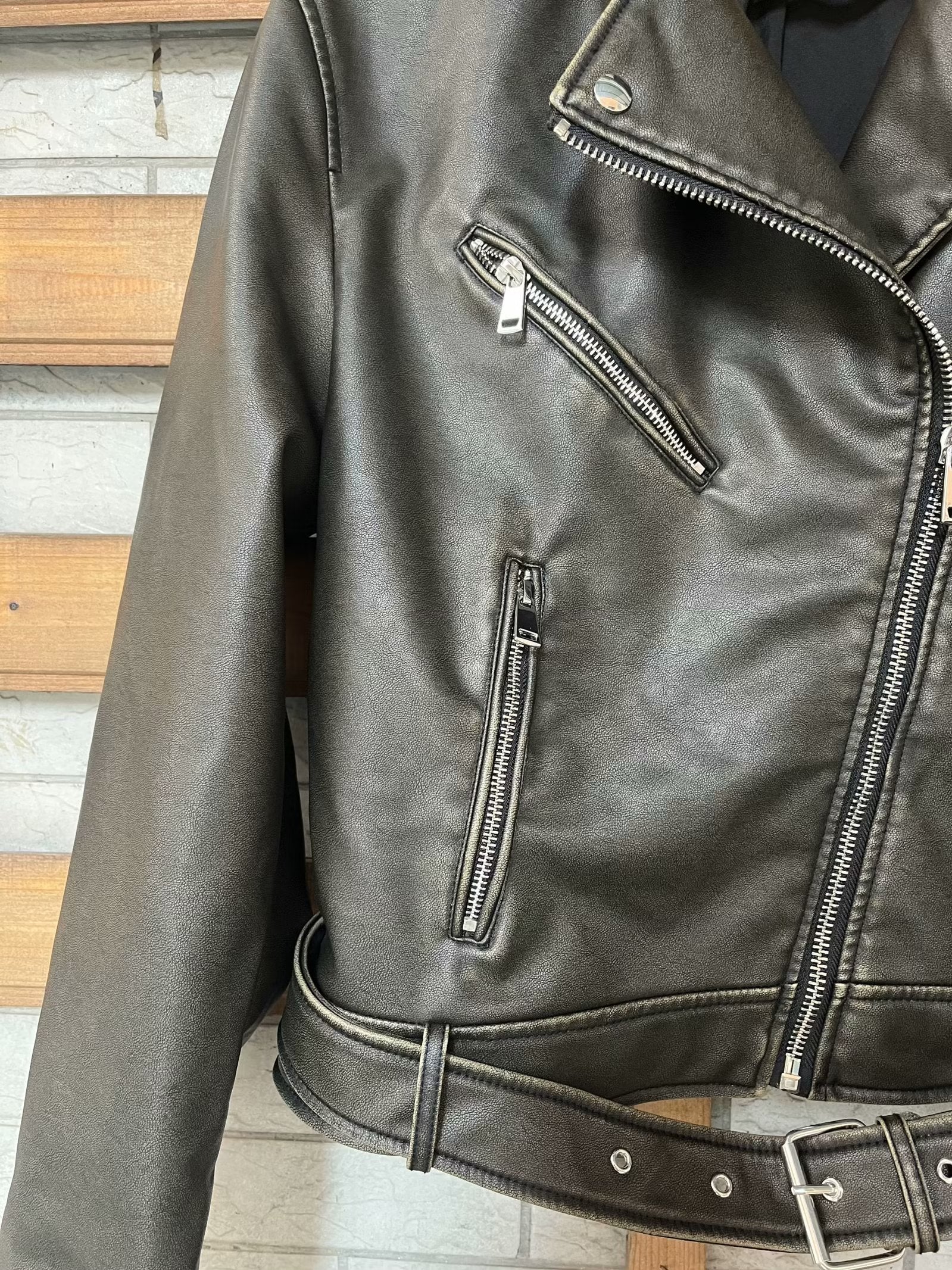Beautiful warm black leather jacket with silver hardware, belt, and Langry fashion