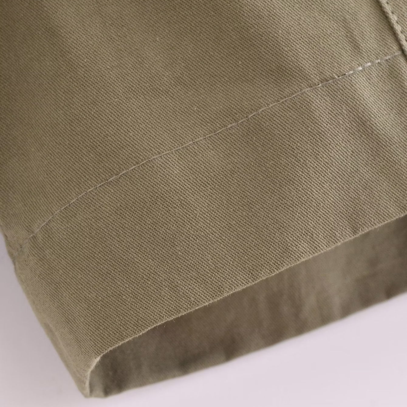 Langry olive green linen skirt with subtle pleats and clean hem in fashion ملابس