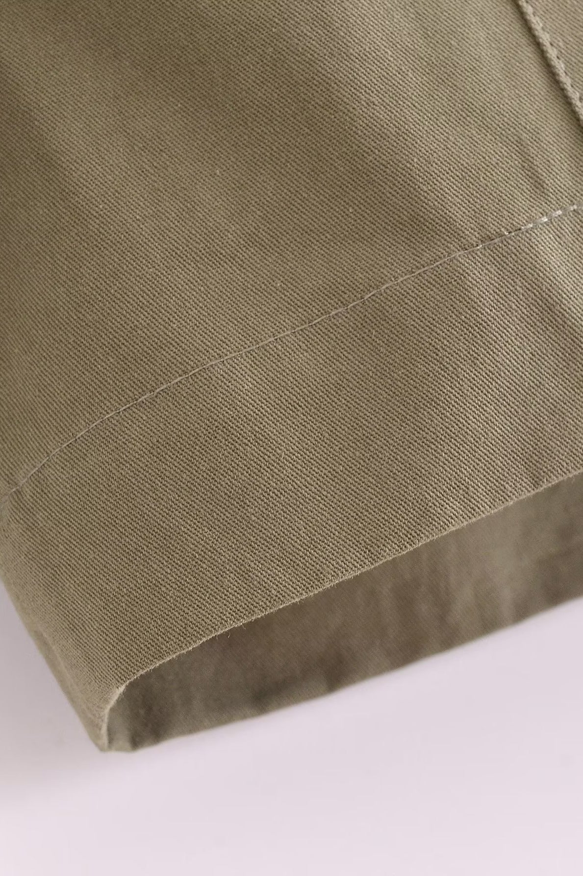 Langry olive green linen skirt with subtle pleats and clean hem in fashion ملابس