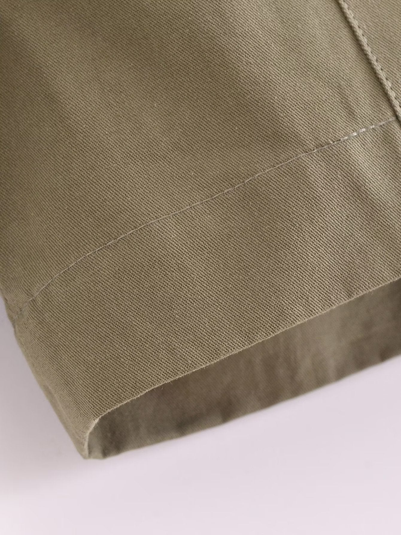 Langry olive green linen skirt with subtle pleats and clean hem in fashion ملابس