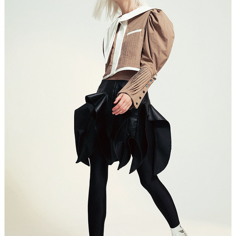 Fashionable woman in avant-garde French Design Short Shirt Jacket showcasing langry style and ملابس