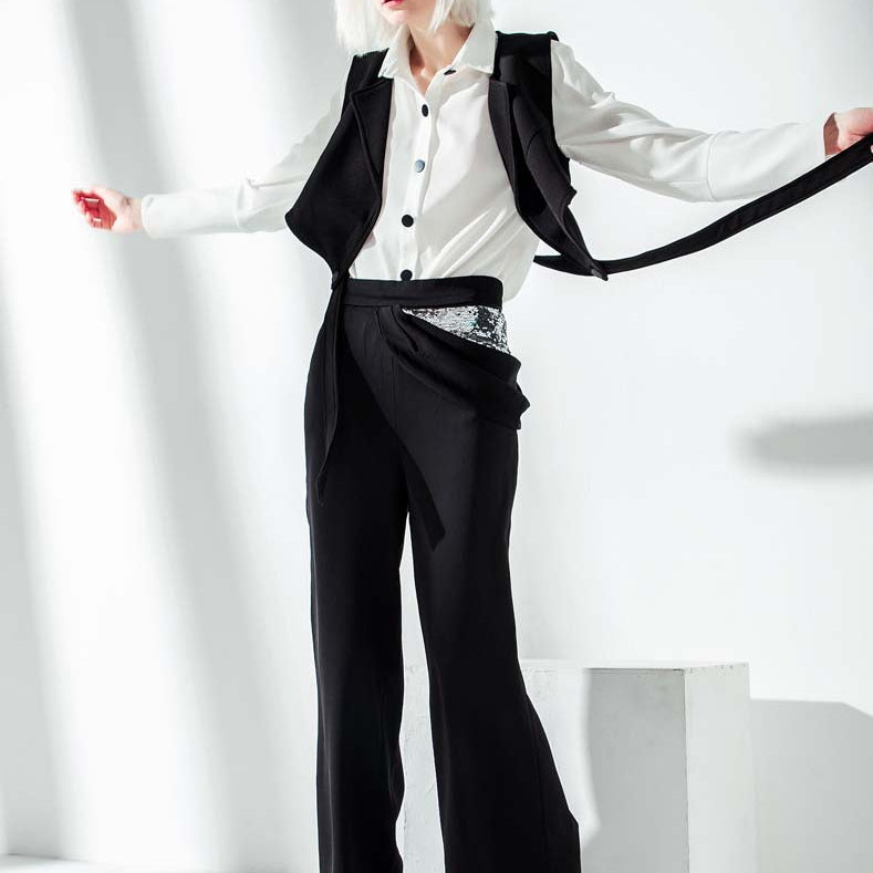 Women’s white button-up shirt with black vest and wide-leg pants in elegant lace two piece suit