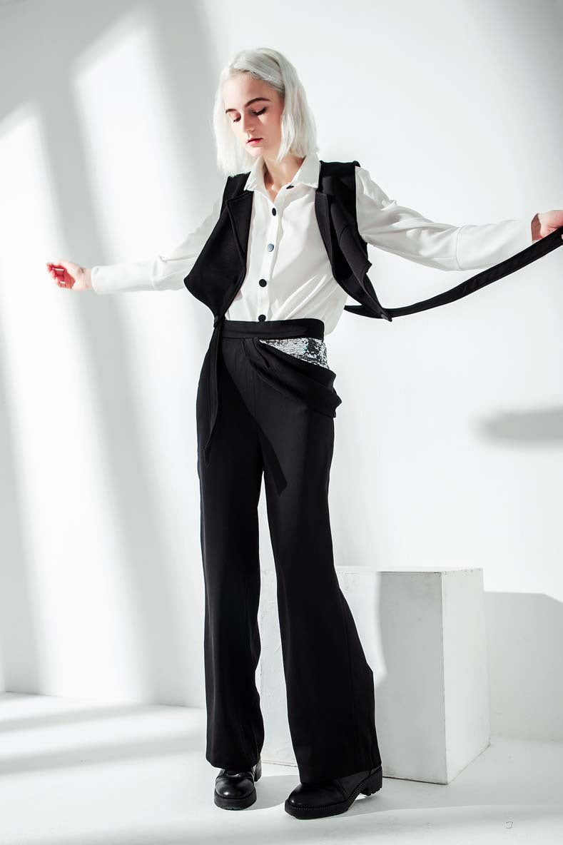 Women’s white button-up shirt with black vest and wide-leg pants in elegant lace two piece suit