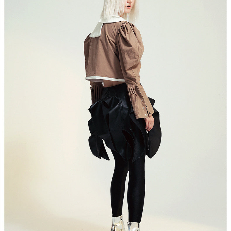 Fashionable woman in avant-garde French Design Short Shirt Jacket showcasing modern ملابس style