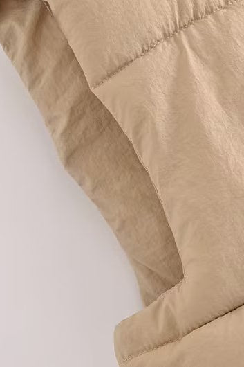 Beige Langry puffer vest with quilted fashion design and zipper