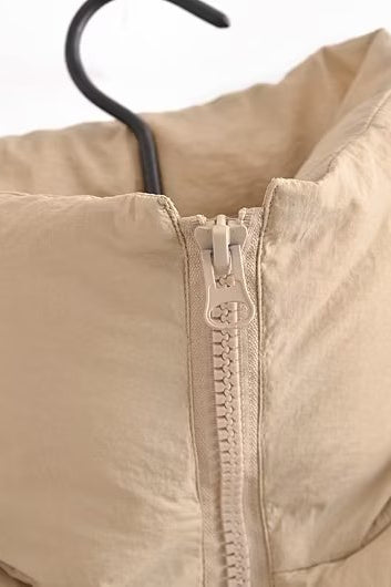 Langry beige puffer jacket vest with hood and zipper on hanger