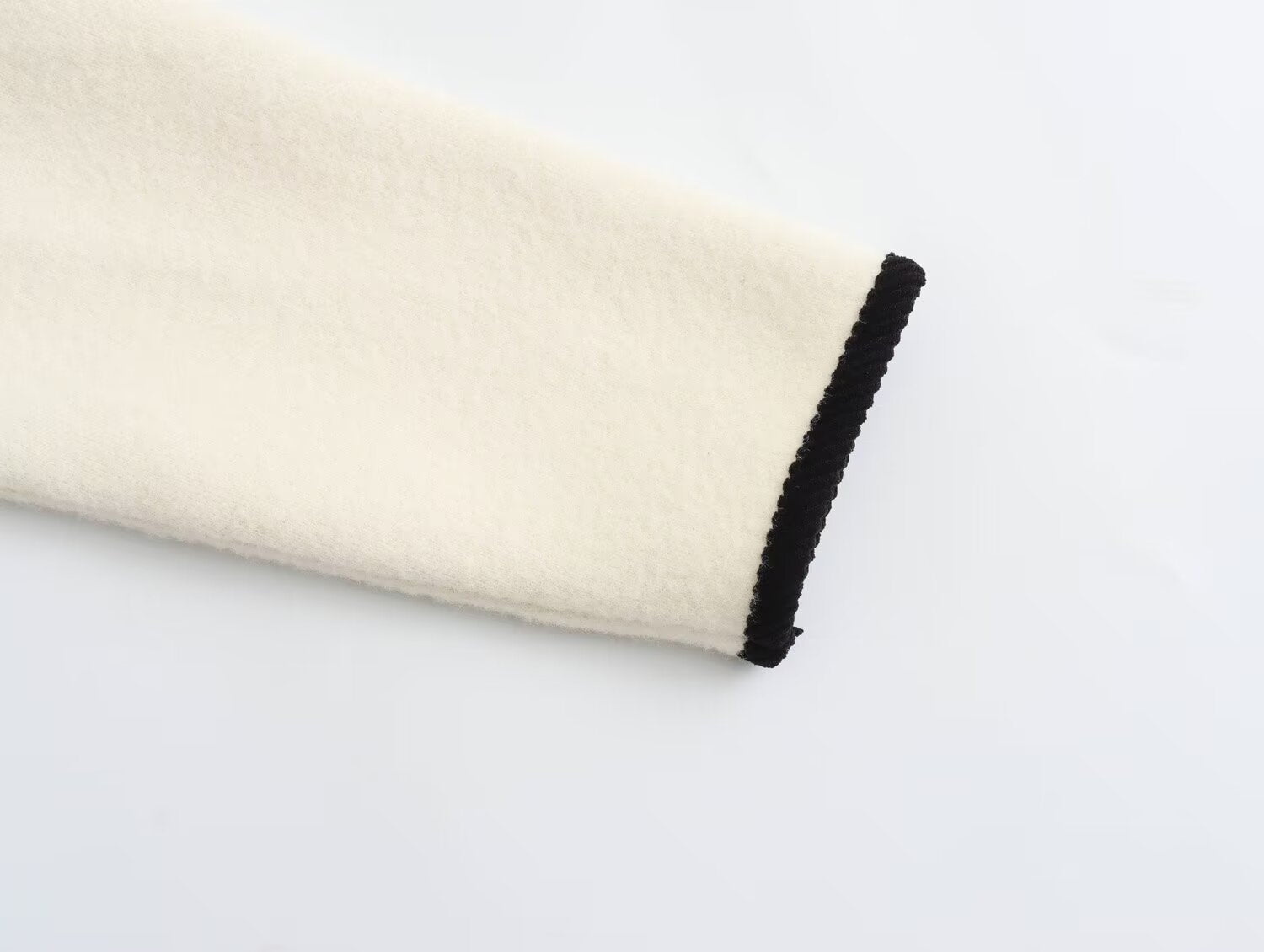 Classic white and black trim sleeve for Langry fashion knitted coat