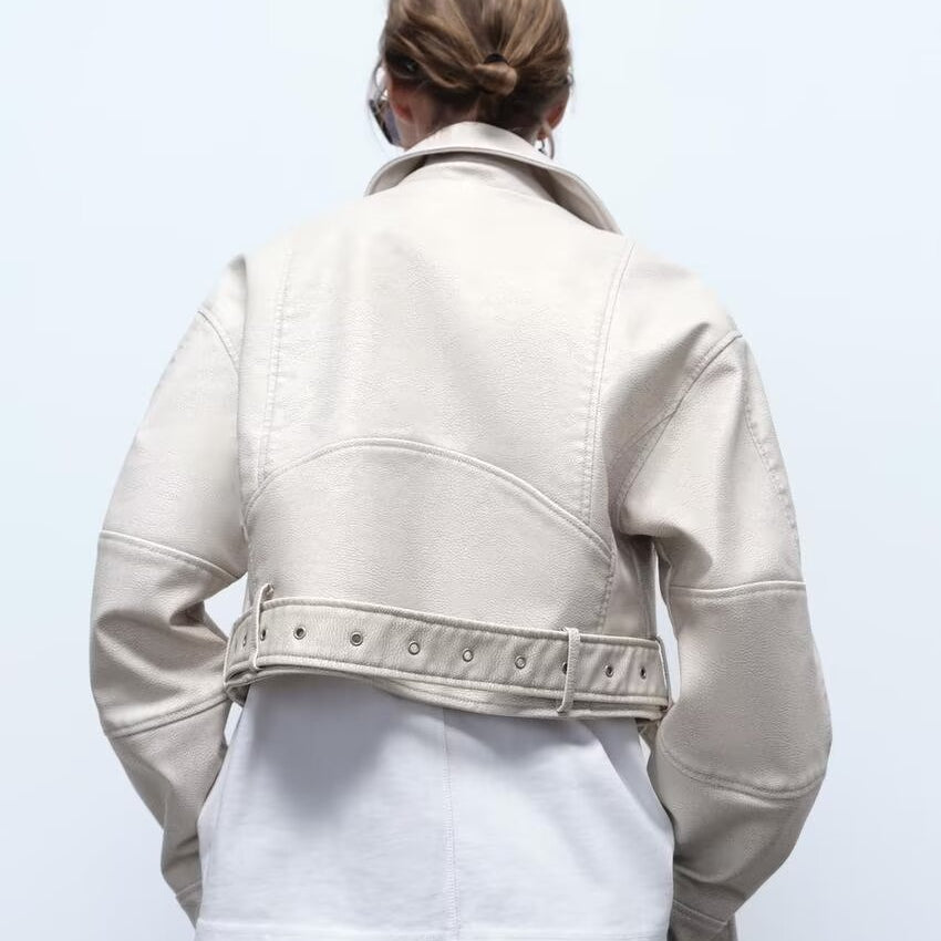 Retro washed faux leather jacket with cream color, studded details and belt