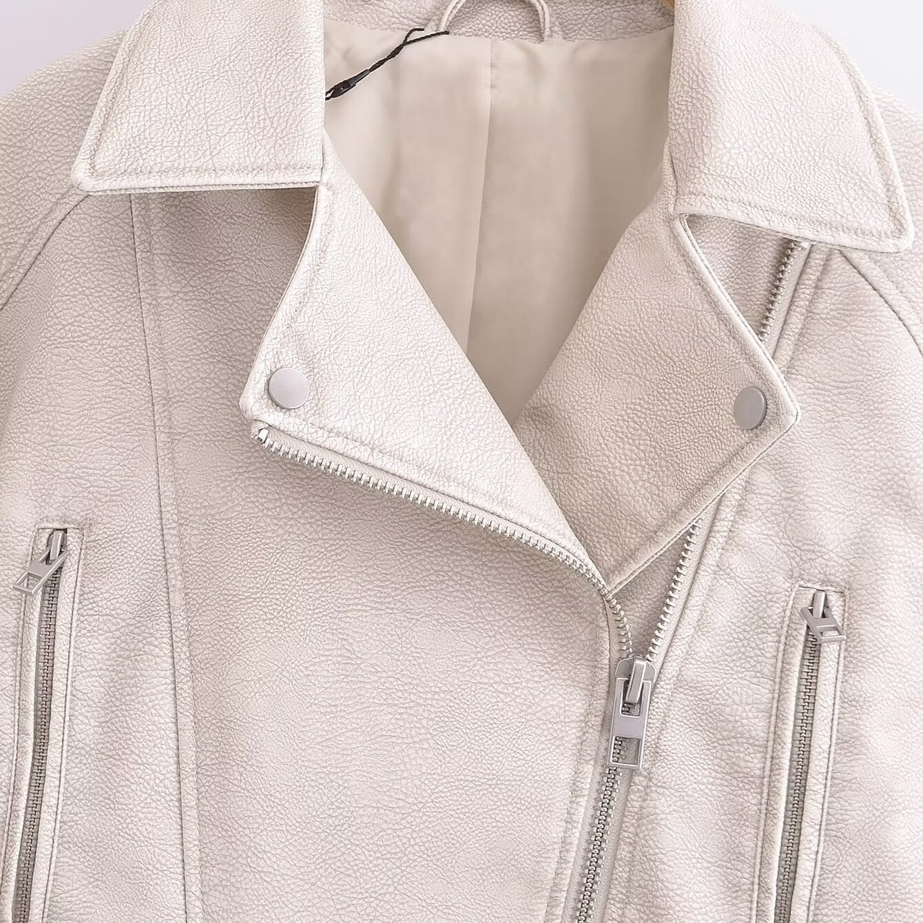 Retro washed faux leather jacket with cream finish and silver details