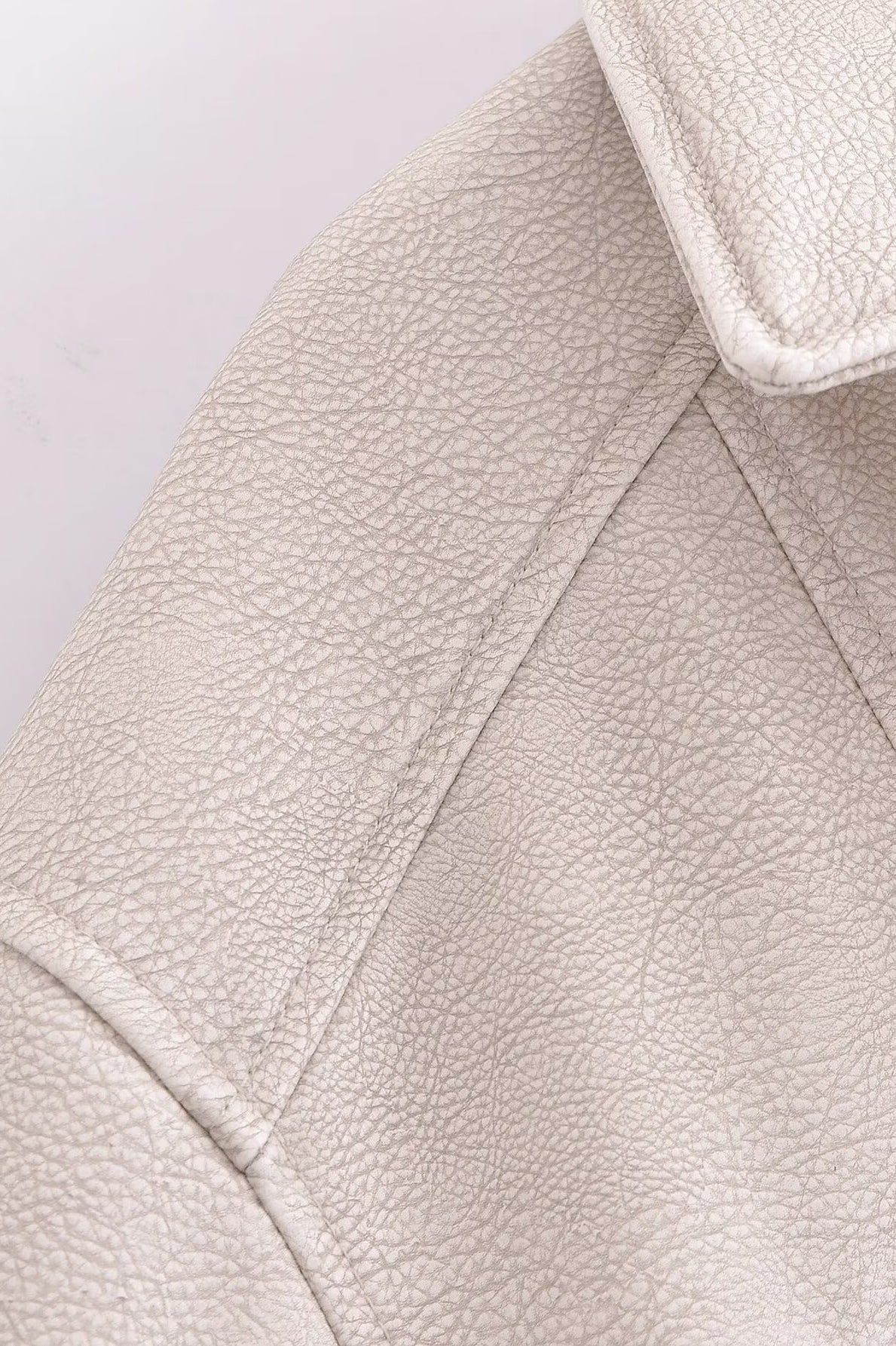 Retro washed faux leather jacket with cream textured surface and notched lapels