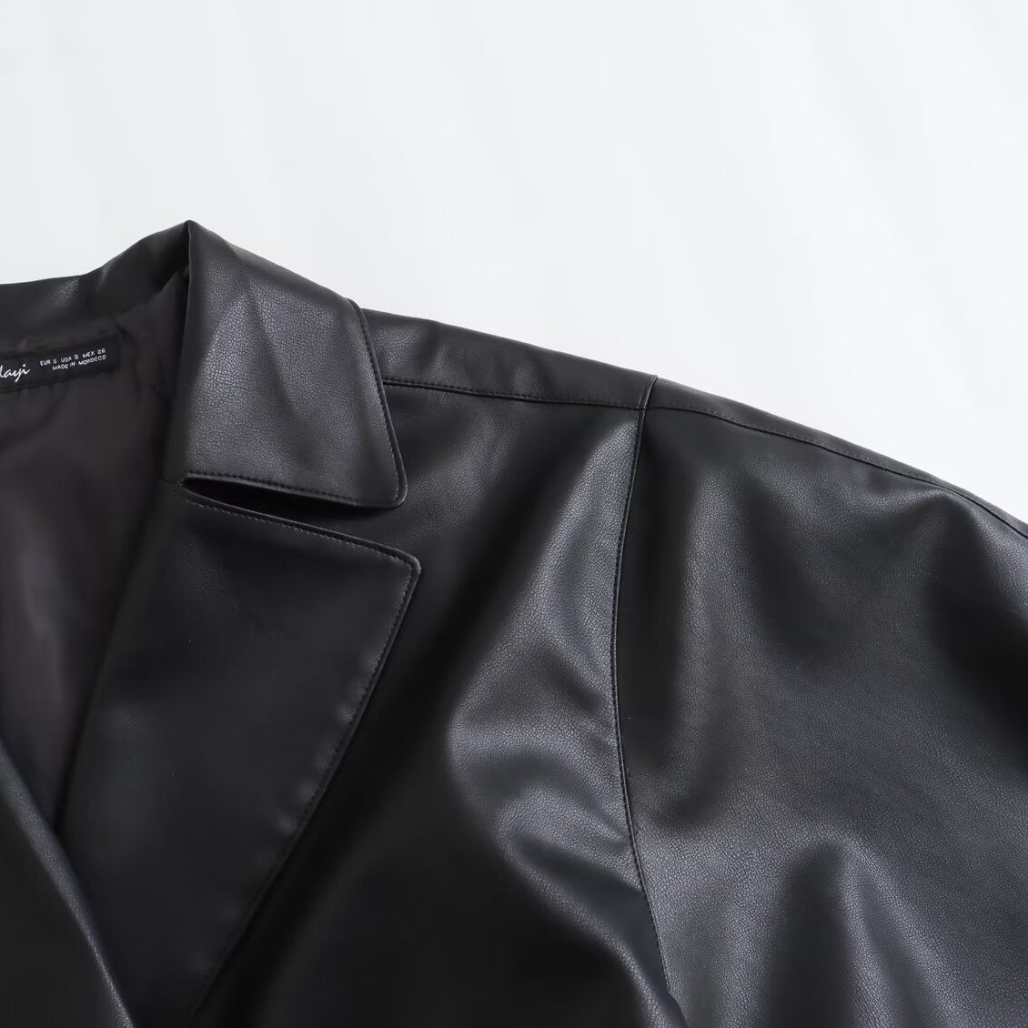 Langry faux leather Spring Street drawstring jacket with high collar and button closure