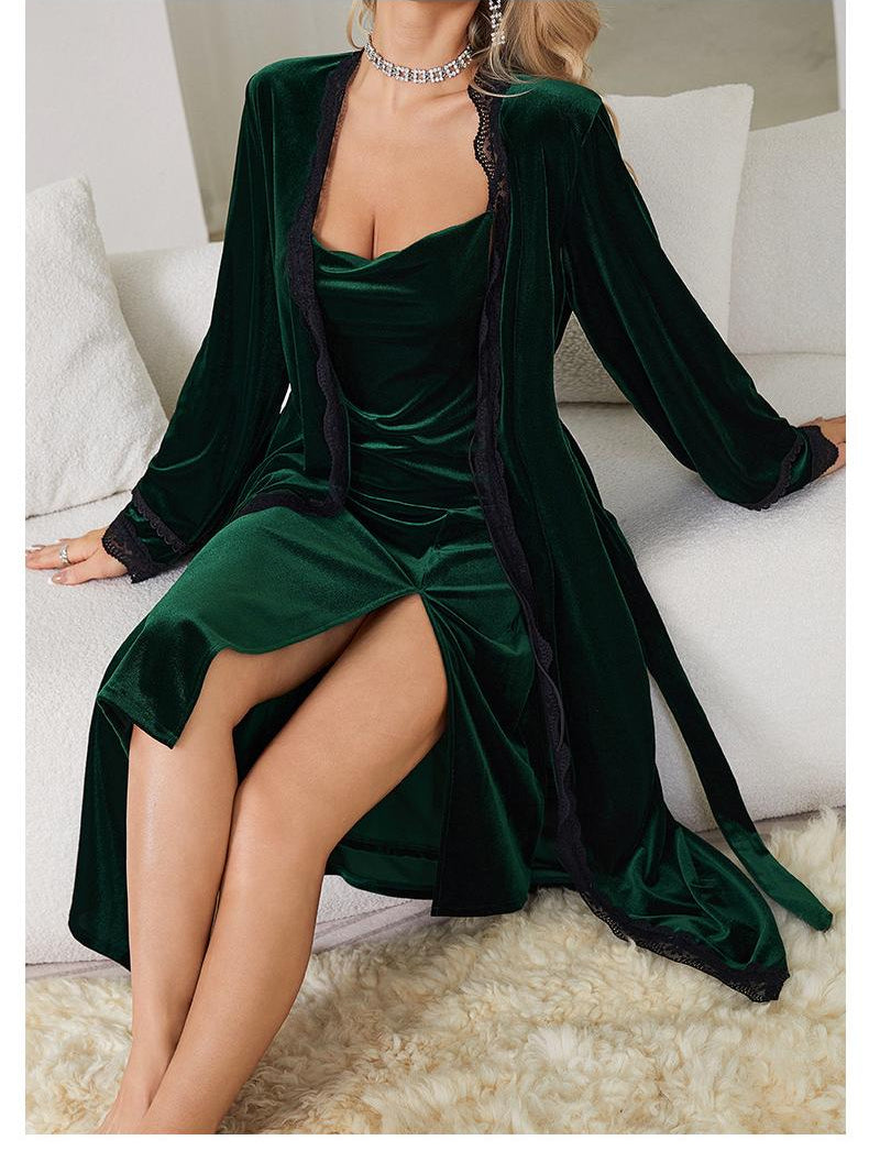 Emerald green velvet langry dress with black lace trim and high slit