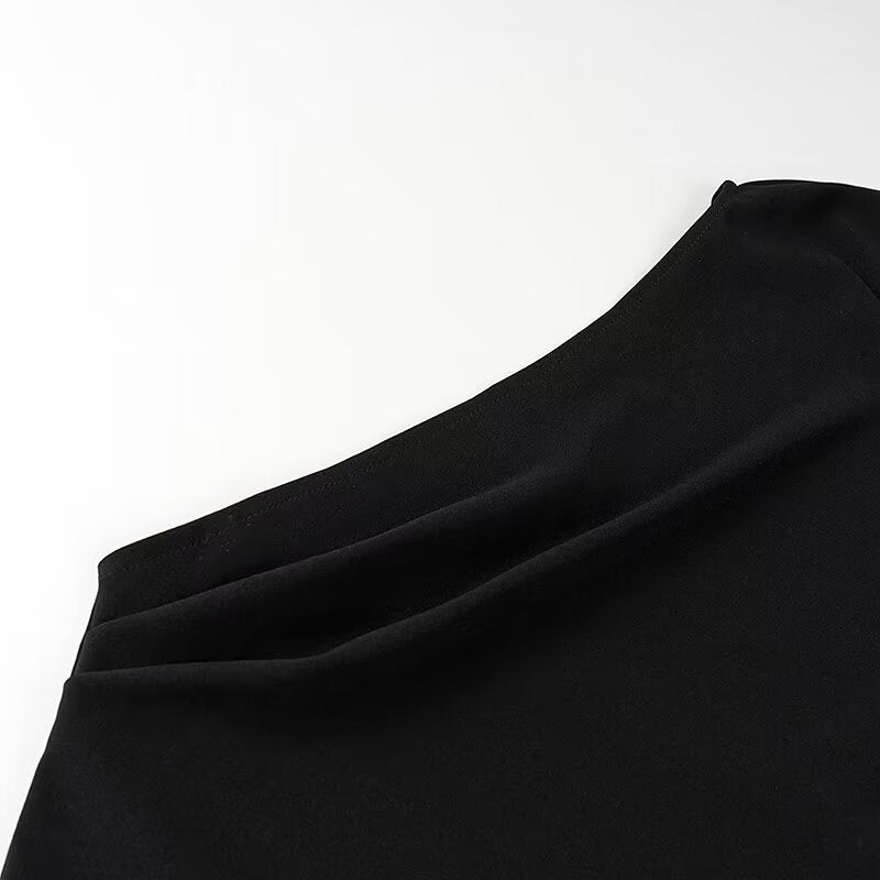 Black fabric with folds in a stylish Langry fashion turtleneck pleated dress