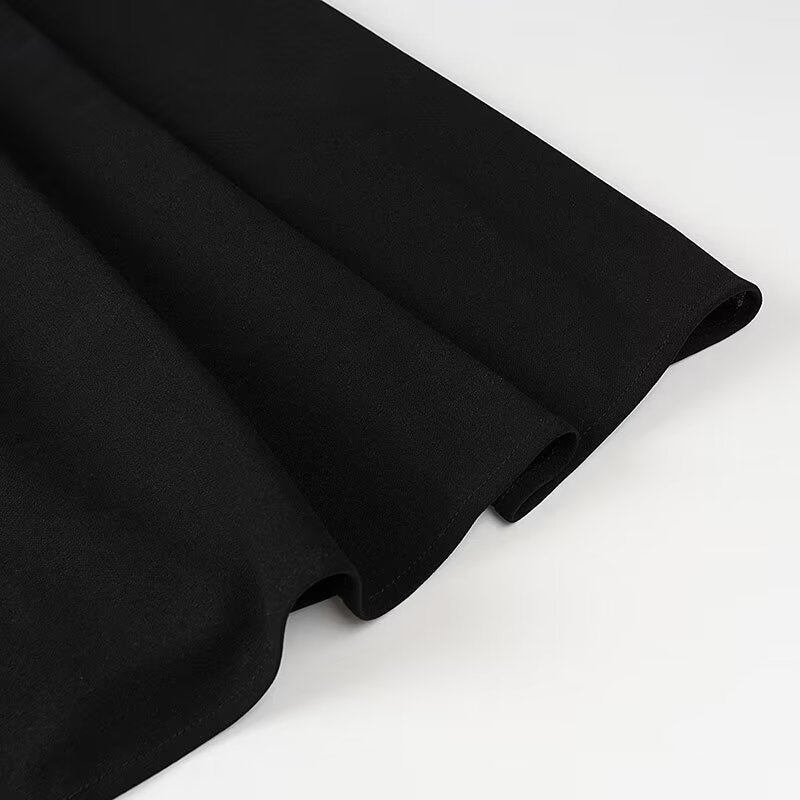 Black fabric with folds showcasing elegant style for Langry fashion ملابس dress