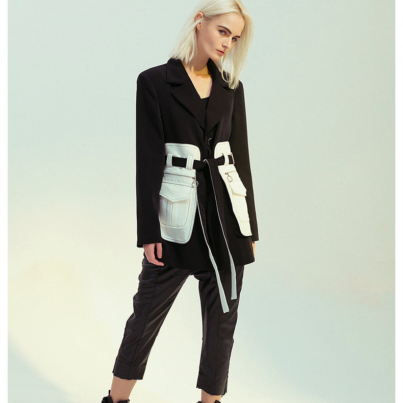 Elegant black white retro blazer featuring a woman’s fashion blazer with utility belt