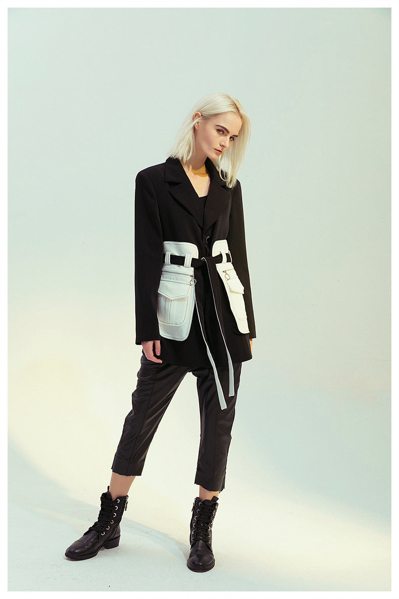 Elegant black white retro blazer featuring a woman’s fashion blazer with utility belt