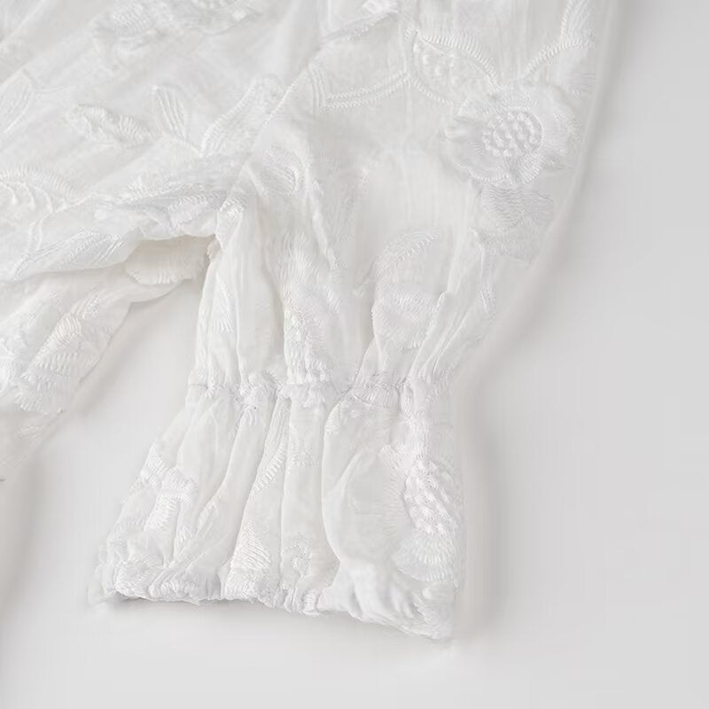 White floral-patterned sleeve with gathered cuff on a Fairy Retro French Maxi Dress