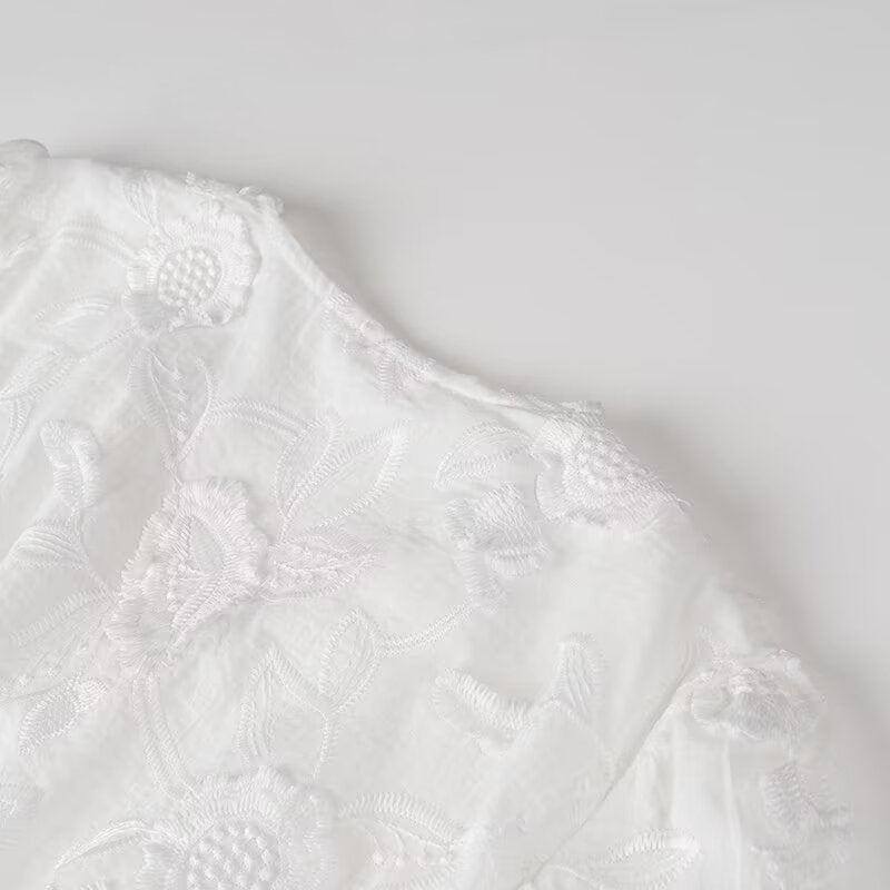 White floral lace fabric featured in Fairy Retro French V Neck Maxi Dress for elegant fashion