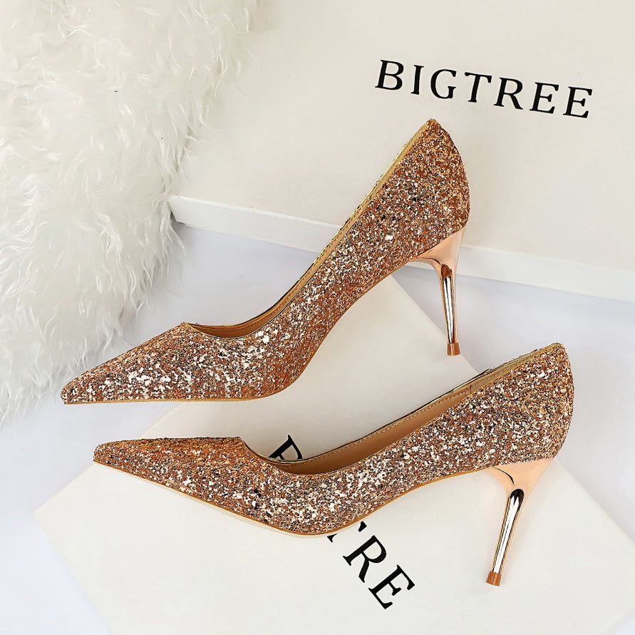 Sparkly gold high heels, a stylish addition to any fashion-forward ملابس collection