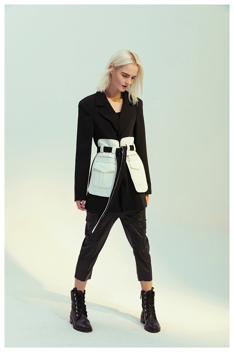 Elegant black and white retro blazer worn by a woman in fashion attire, ملابس style