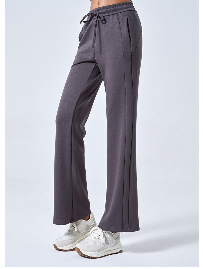 Gray athletic pants with drawstring waist and flared legs for stylish summer sports fashion