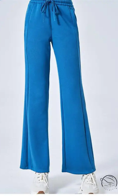 Blue summer air layer drawstring wide-leg sweatpants with white sneakers