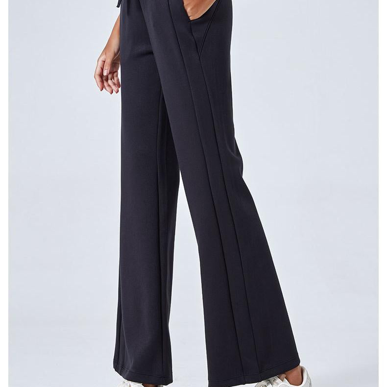 Black wide-leg athletic pants with drawstring waist, ideal for fashion and ملابس activities