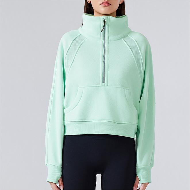 Mint green half-zip sweatshirt for women, stylish and warm, ideal for autumn and winter fashion