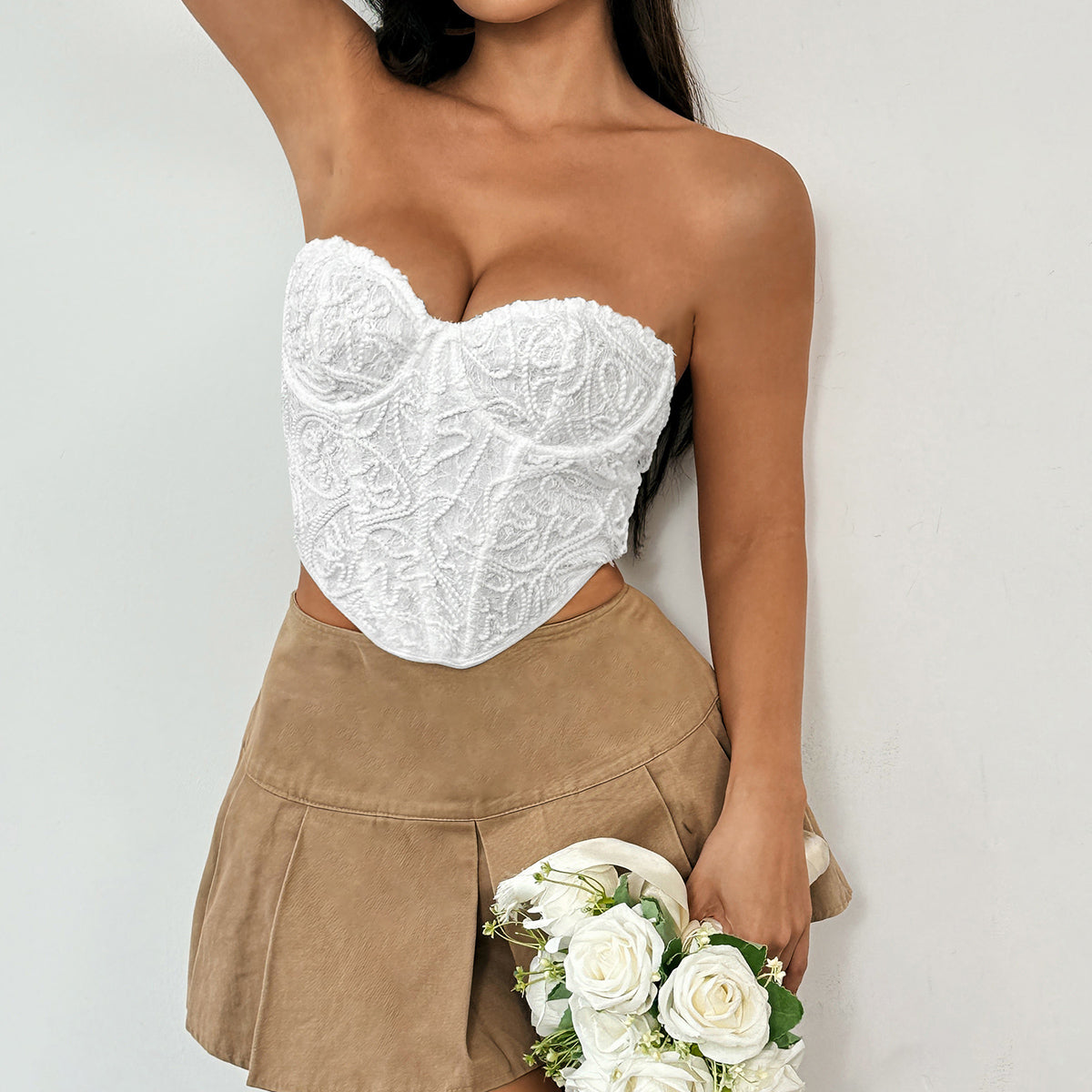 White strapless lace corset top with diamond boning and sweetheart neckline for fashion