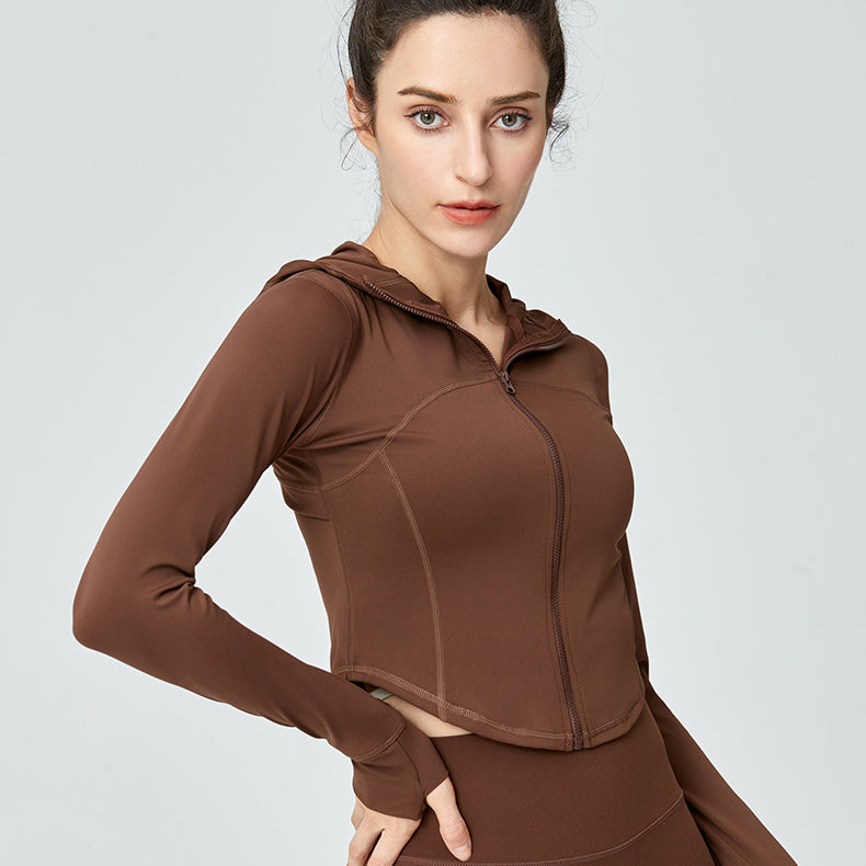 Brown hooded athletic jacket for women, ideal for sports and workout fashion ملابس