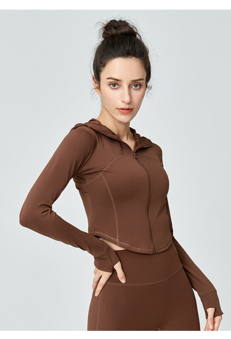 Brown hooded athletic jacket for women, ideal for sports and workout fashion ملابس