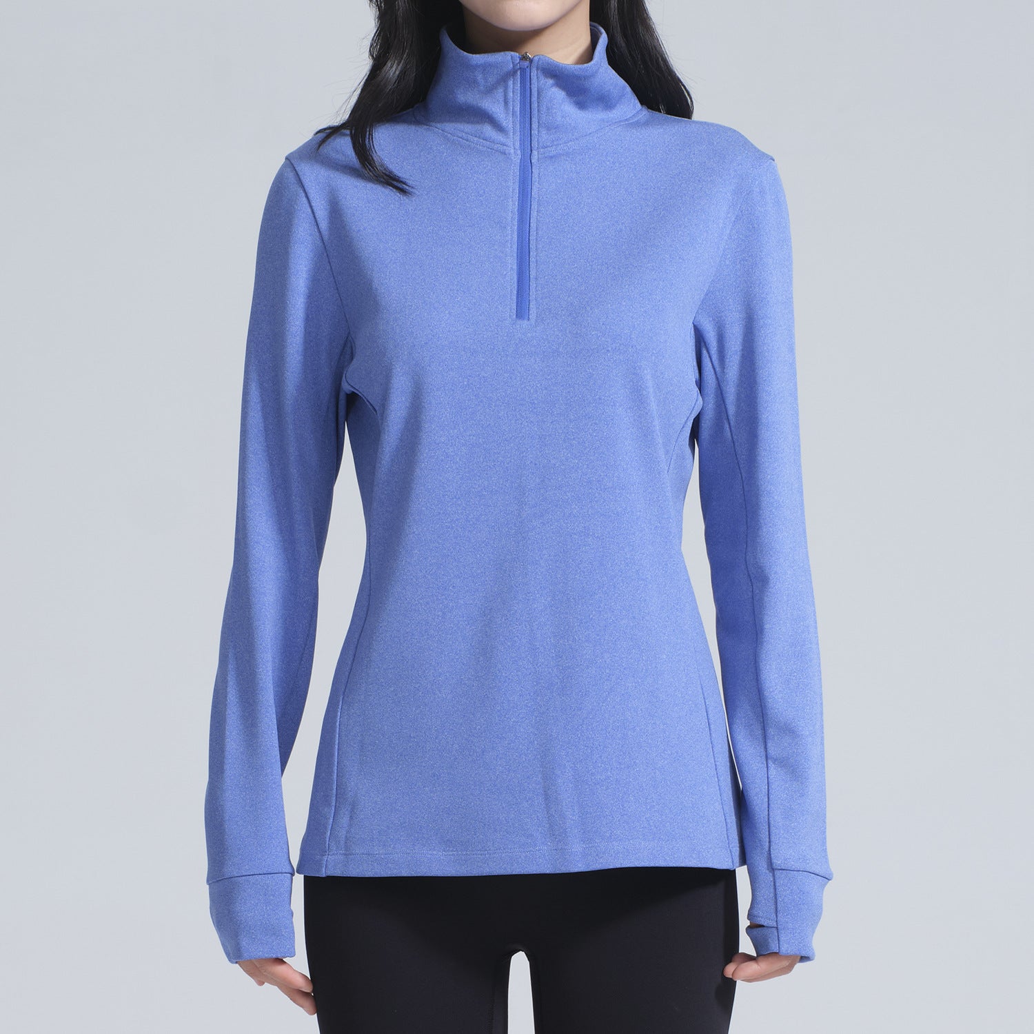 Periwinkle blue long-sleeve athletic top with quarter-zip mock neck for winter thermal fashion