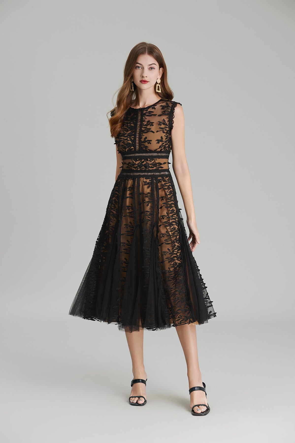 Elegant black lace midi dress featuring embroidered three dimensional mesh design
