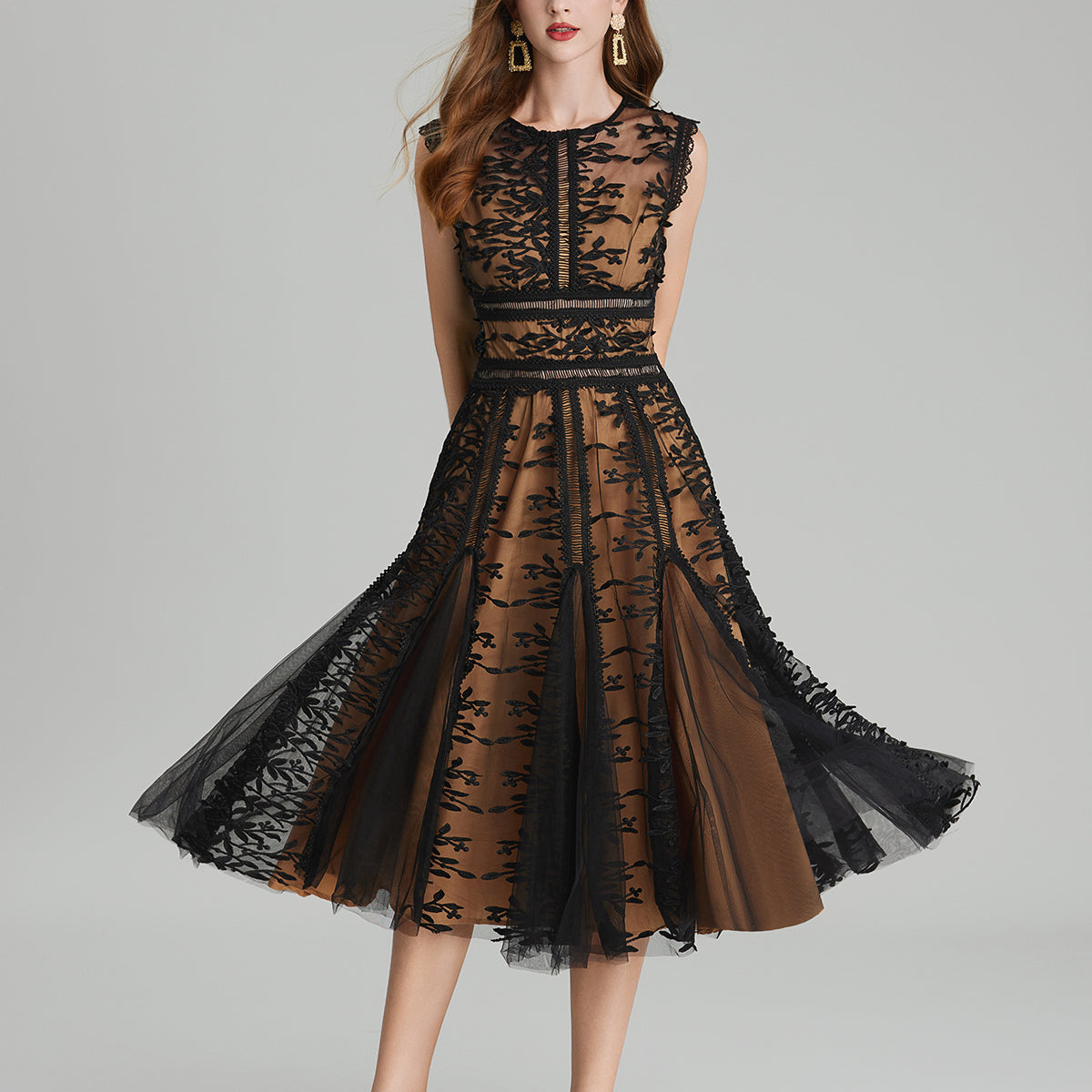 Elegant black lace midi dress featuring embroidered three dimensional mesh and mesh waist design