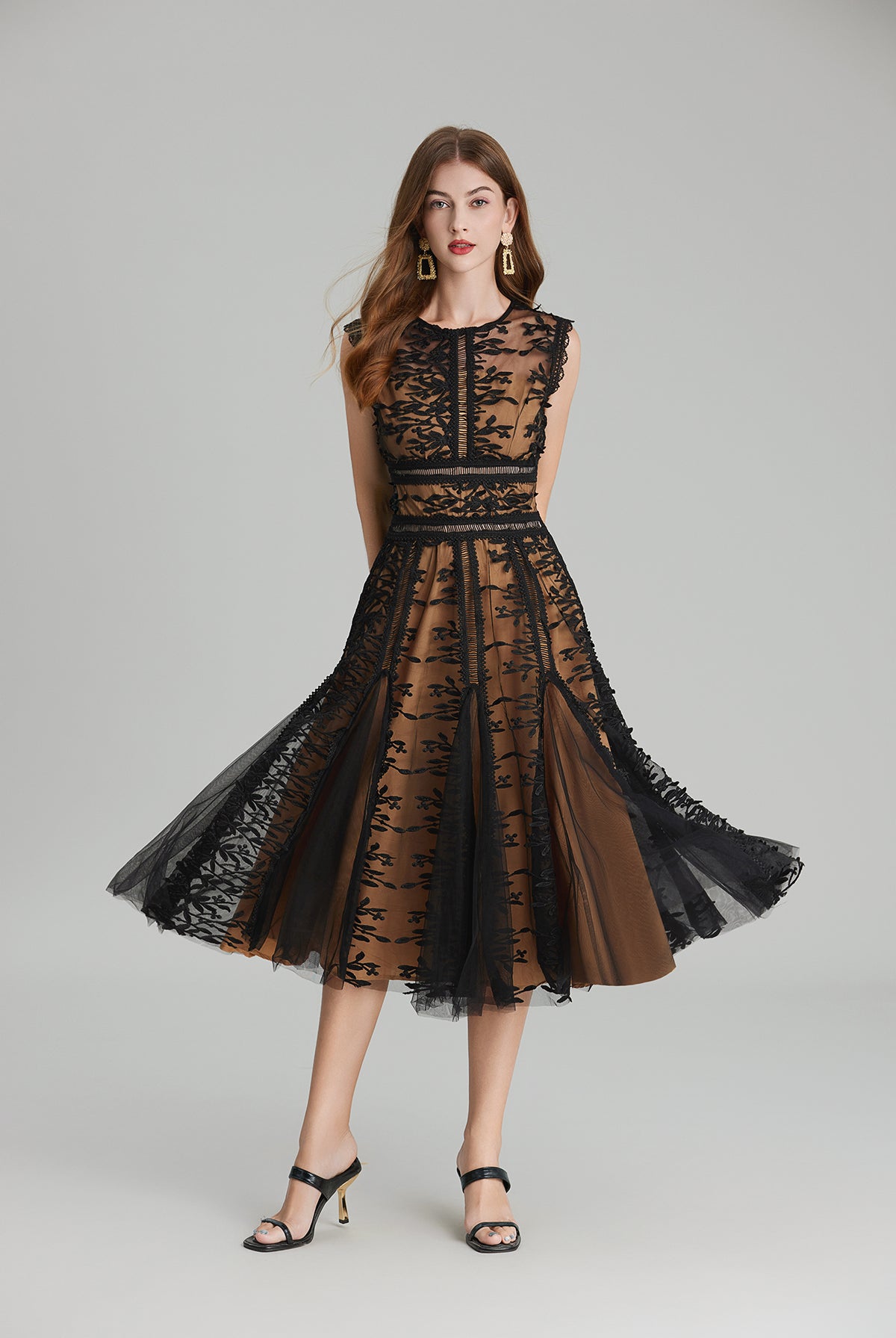 Elegant black lace midi dress featuring embroidered three dimensional mesh and mesh waist design