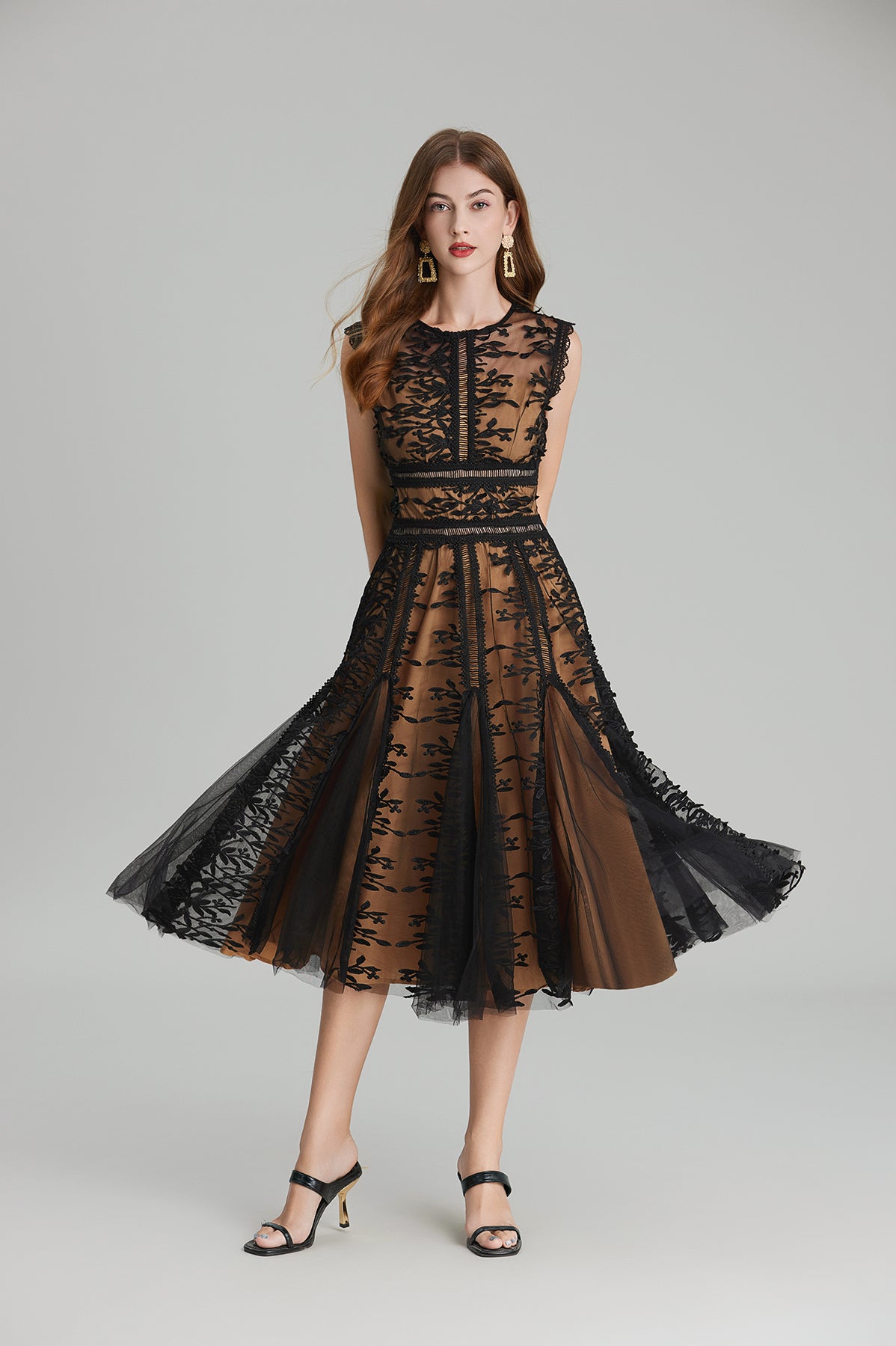 Elegant black lace midi dress featuring embroidered three dimensional mesh and mesh waist design