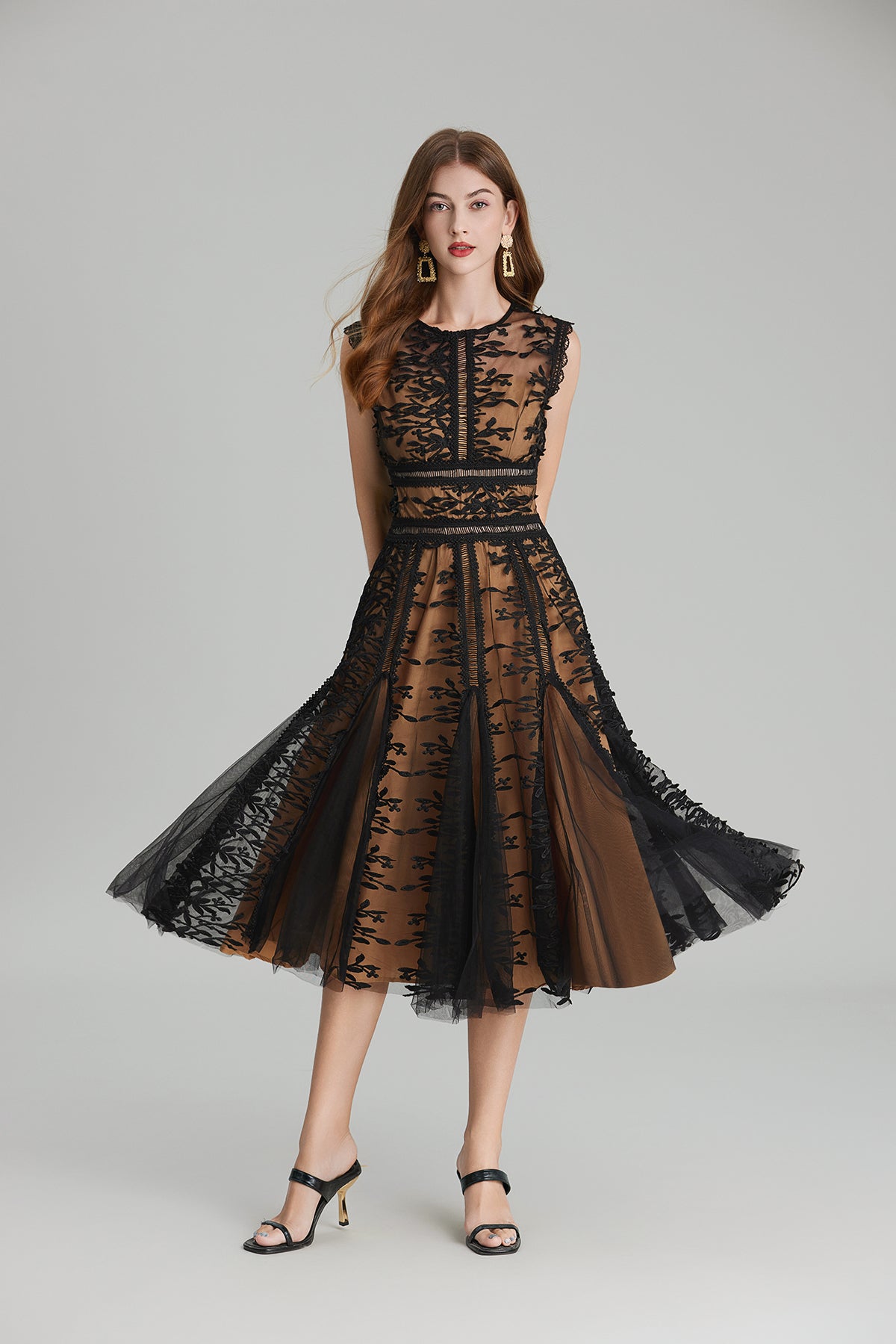Elegant black lace midi dress featuring embroidered three dimensional mesh and mesh waist design