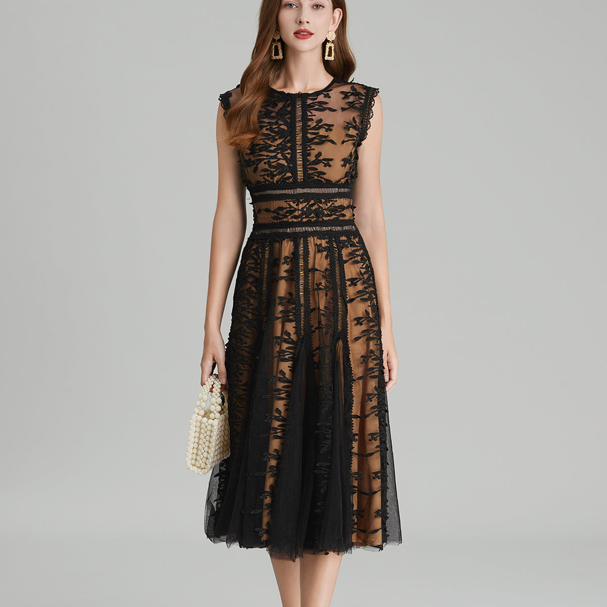 Elegant black lace midi dress featuring embroidered three dimensional mesh and delicate lace details