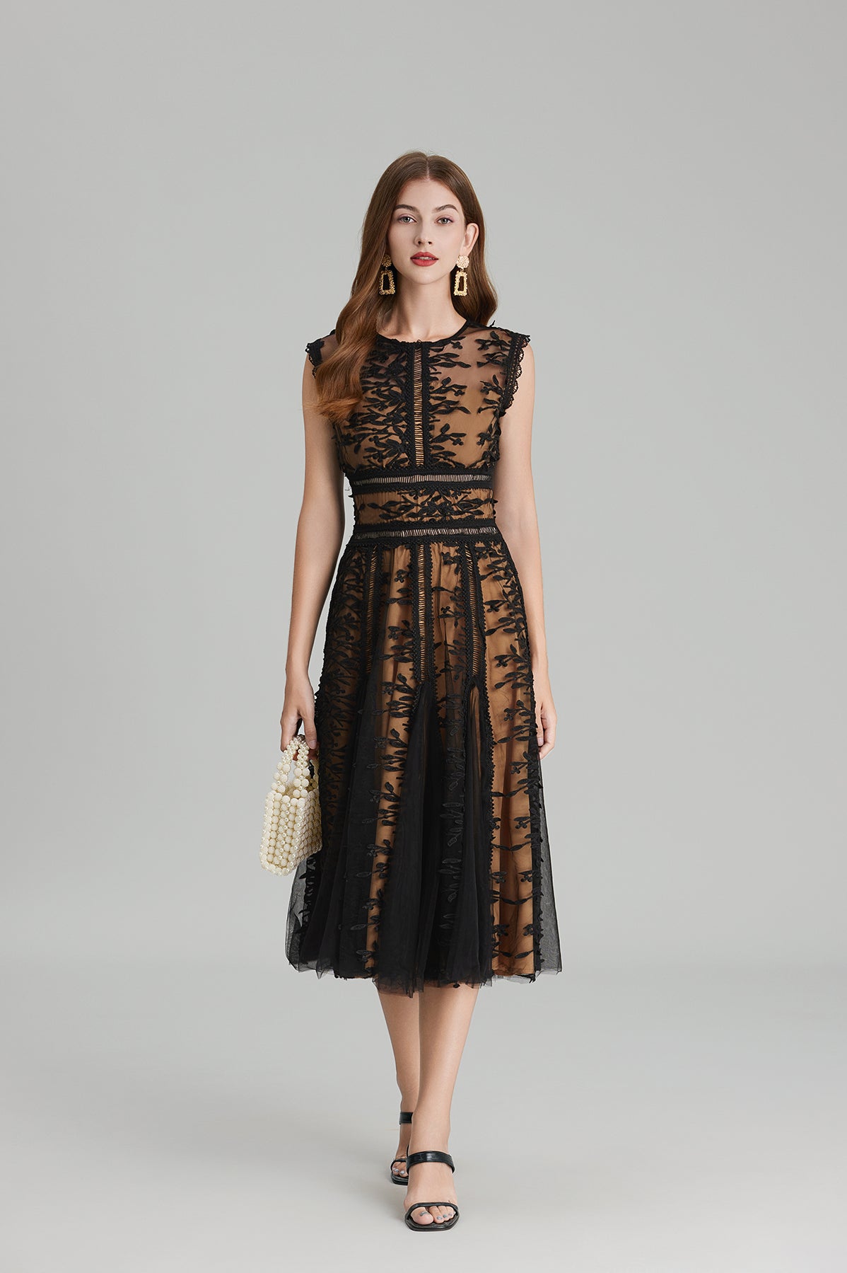 Elegant black lace midi dress featuring embroidered three dimensional mesh and delicate lace details