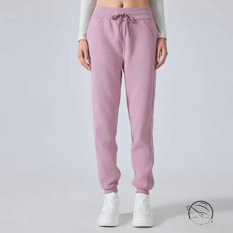 Pink drawstring loose tapered sports pants with elastic cuffs