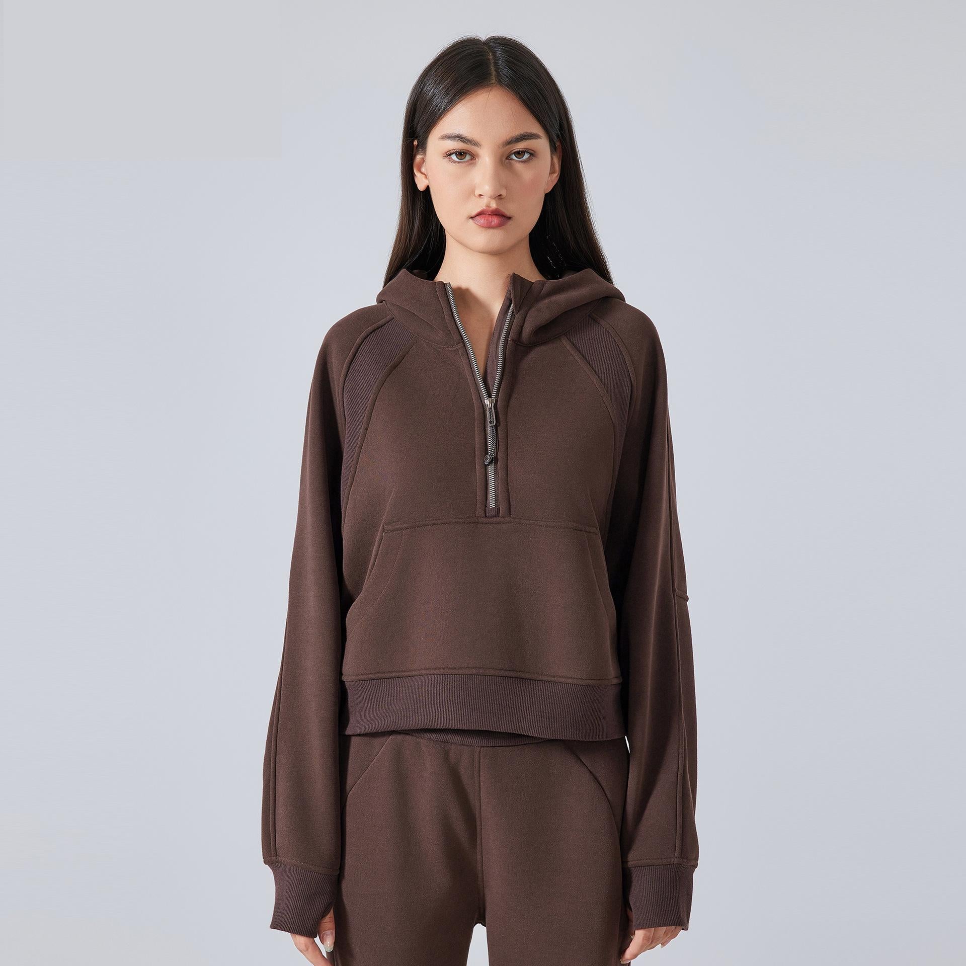 Brown hooded half-zip sweatshirt, perfect for activewear and cozy autumn winter fashion