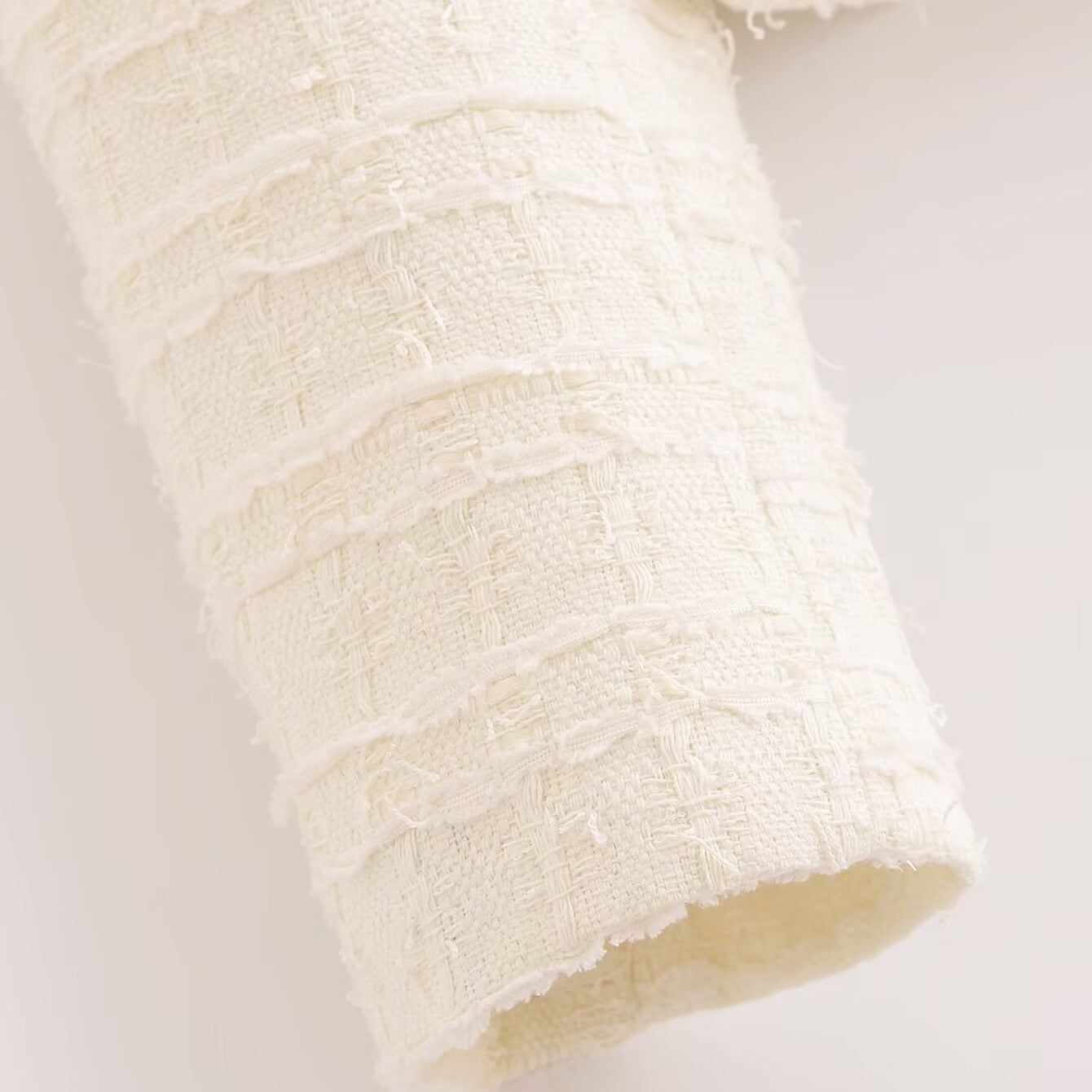 Cream lace fabric roll with floral texture for Langry fashion coats