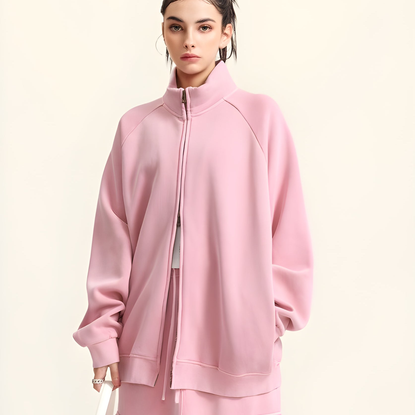 Pink zip-up sweatshirt with raglan sleeves, ideal for stylish winter fashion ملابس