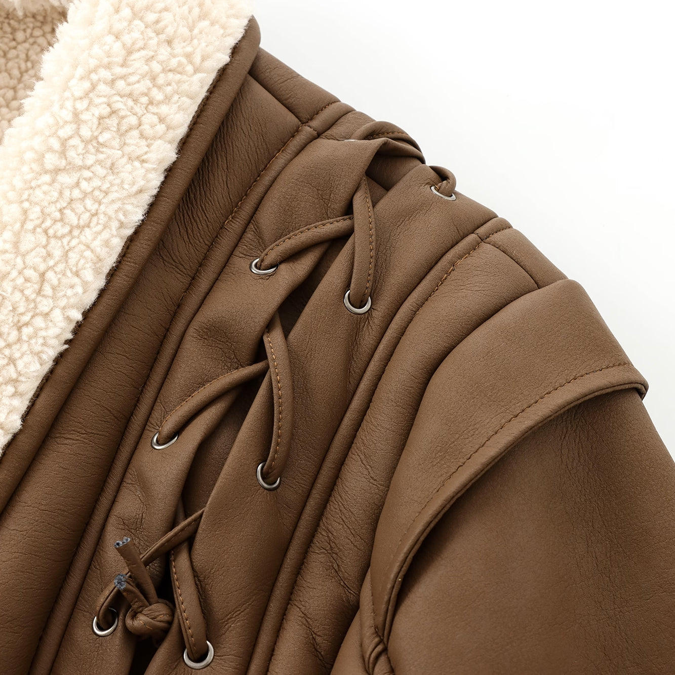 Brown faux leather jacket with sherpa lining and lace-up detail for stylish، langry fashion and ملابس